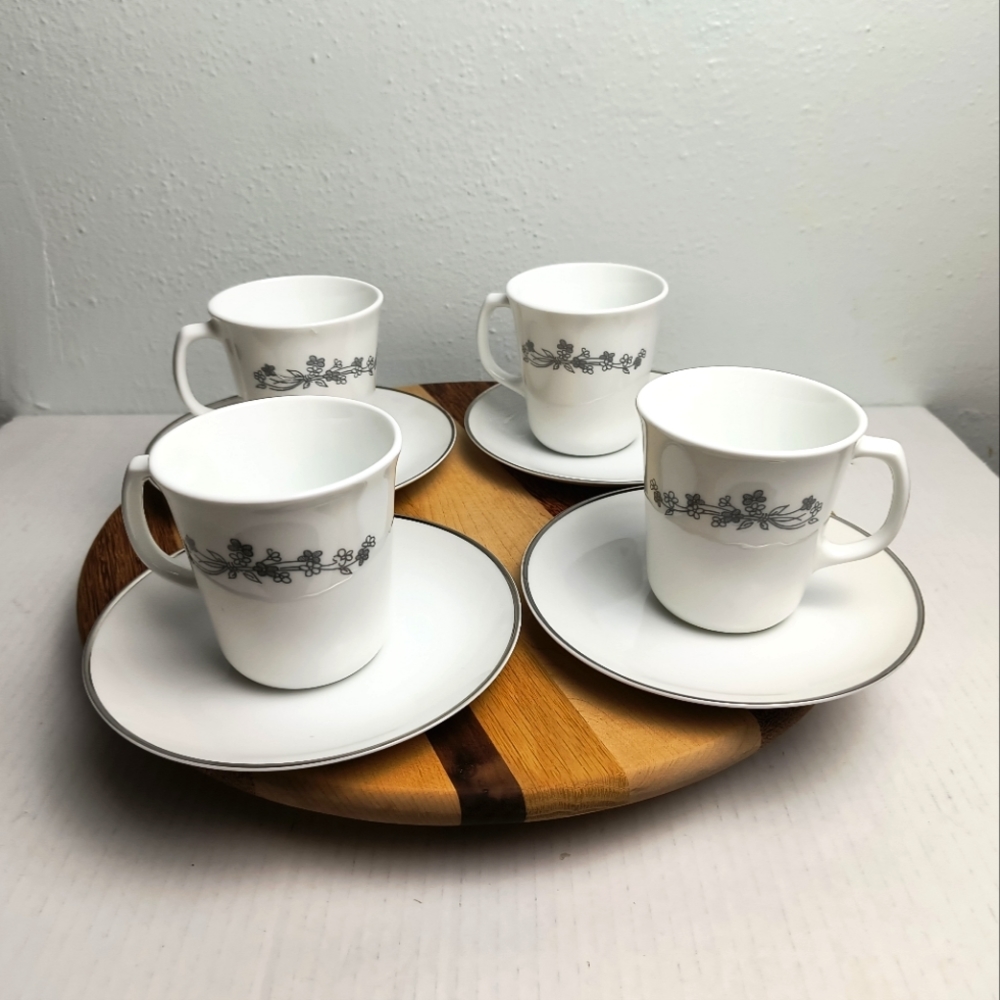Set Of 4 Coffee Tea Cups and Saucers White Silver
